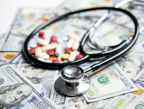 Prescription drugs, money, and stethoscope